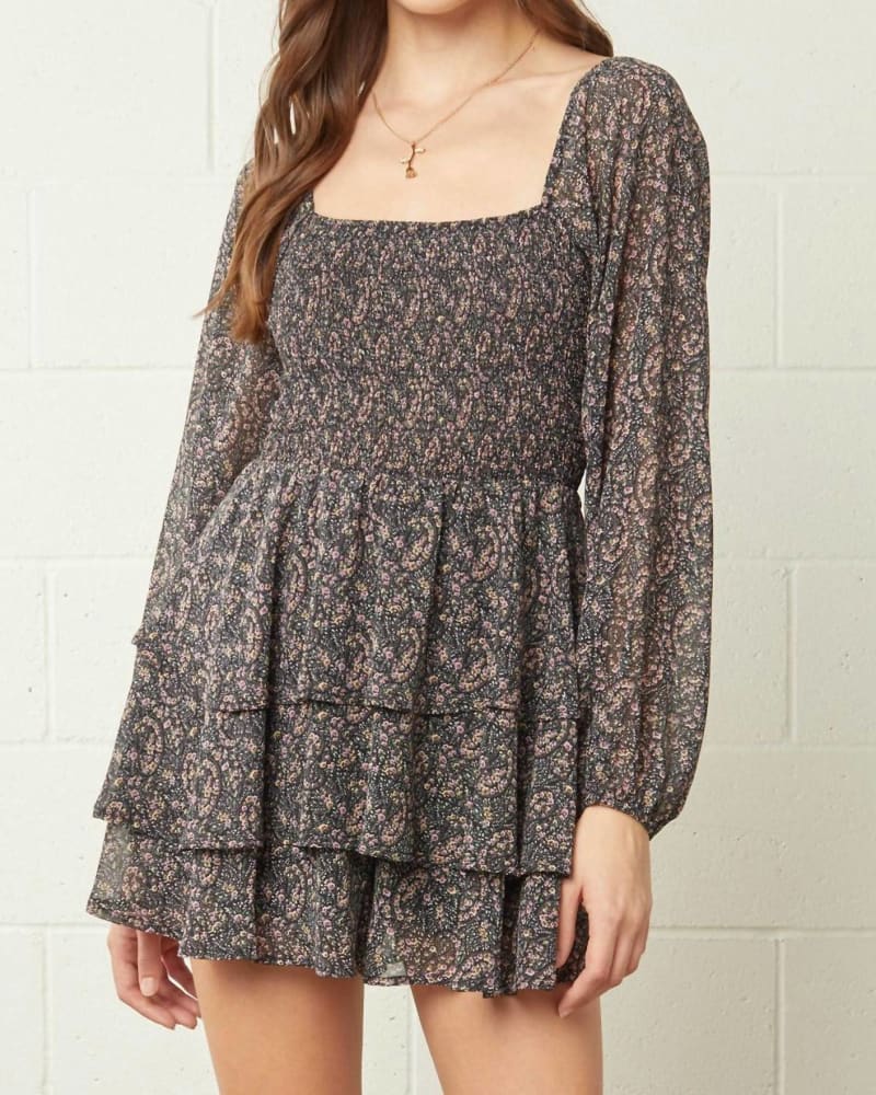 Front of a model wearing a size Large Square Neck Long Sleeve Romper In Black/Floral Print in Black/Floral Print by entro. | dia_product_style_image_id:355817